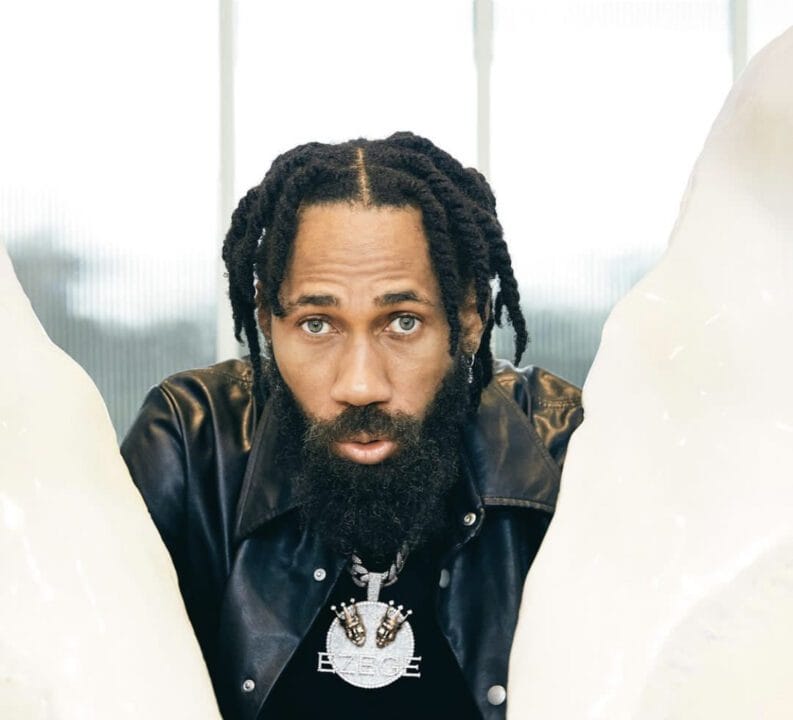 Phyno rapping in Igbo traditional attire