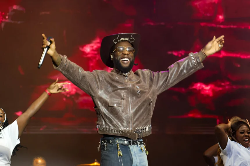 Burna Boy performing at Madison Square Garden representing his $22 million net worth from touring and streaming